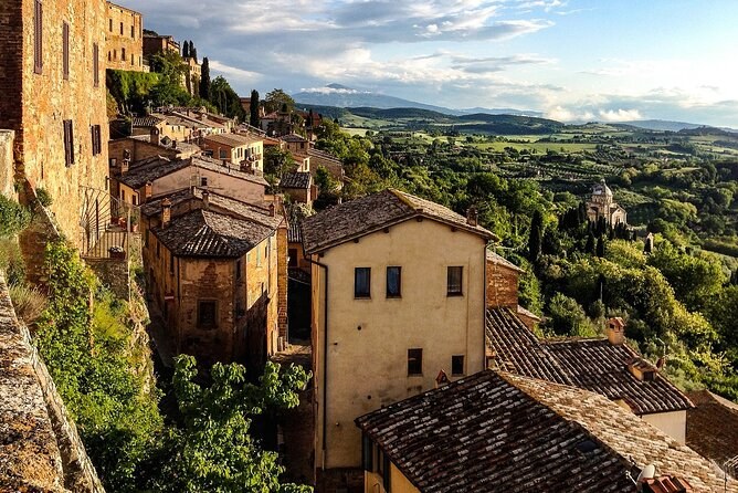 Stone houses stepping down Montepulciano's hillside above the valley