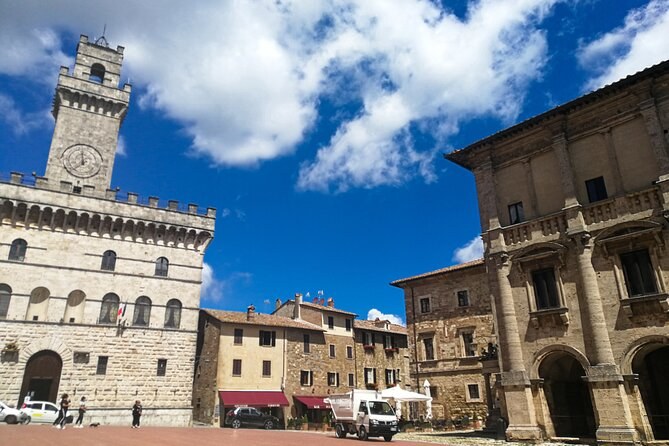 Piazza Grande in Montepulciano, the Palazzo Comunale and its clock tower on the left and a Renaissance palace front on the right